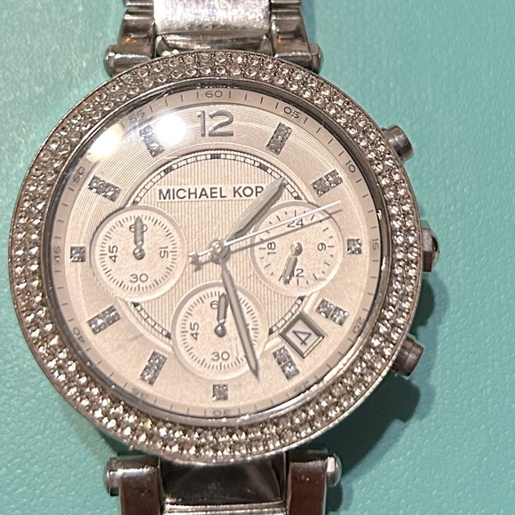 MK watch. In GUC has scratches on the band. - Picture 1 of 1